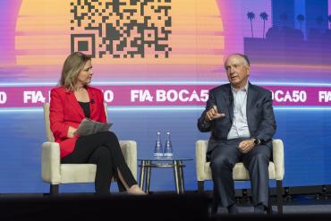 NBC senior business correspondent Christine Romans interviews Citigroup chair John Dugan on the stage at FIA Boca 50